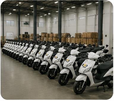 Ozoride white electric scooty fleet inside operations warehouse